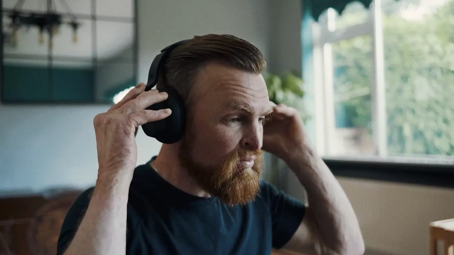 Karl Hinett wearing headphones